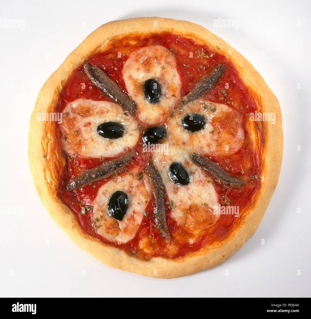 Anchovy pizza with cheese and black olives Stock Photo Alamy