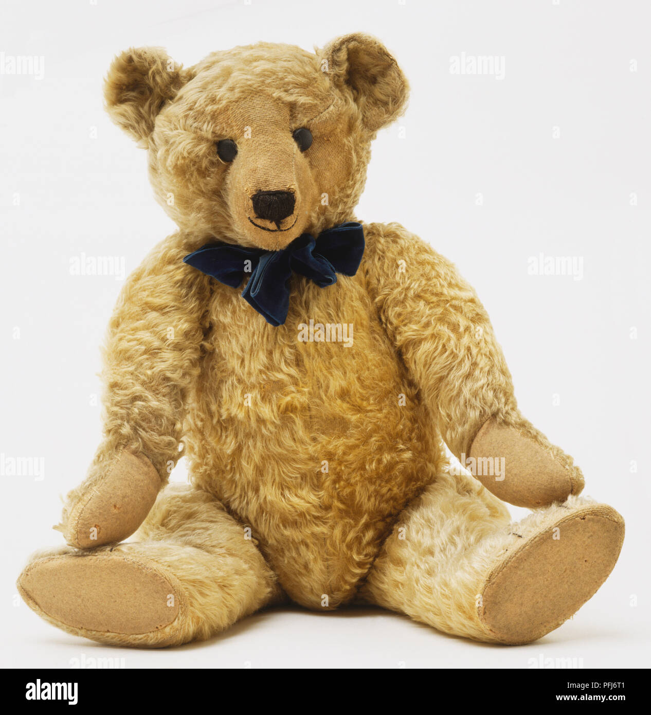 teddy bear with black bow tie