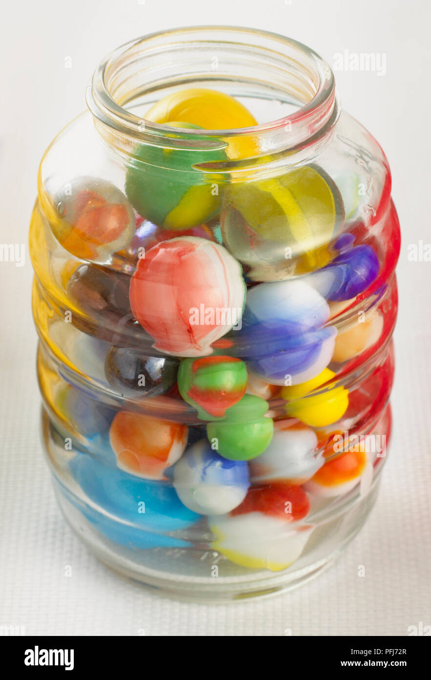 Rubber balls in a glass jar Stock Photo Alamy