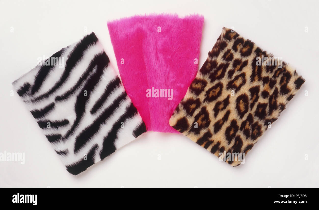 Three furry fabric squares, pink, leopardskin and white tiger pattern Stock Photo