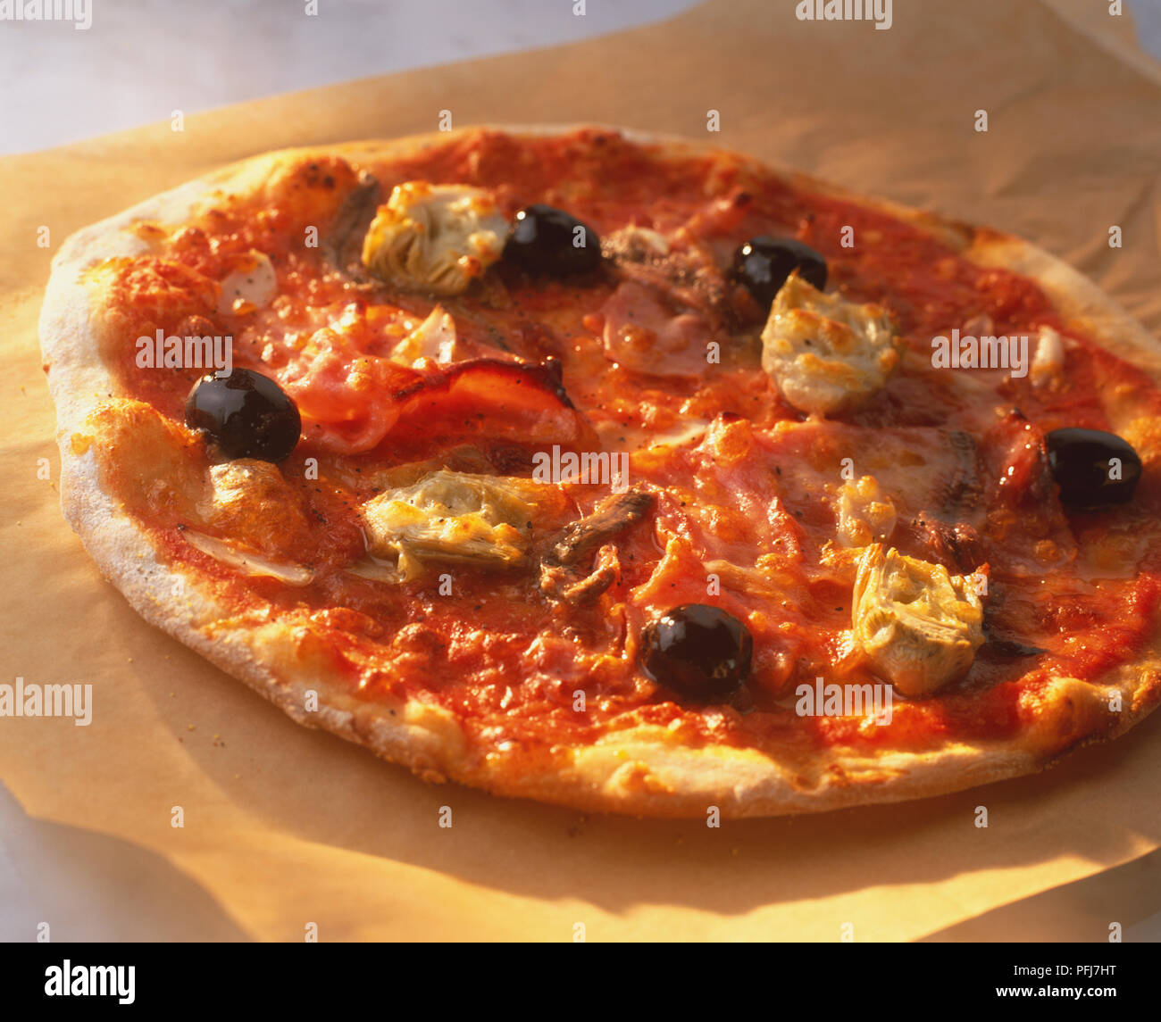 Pizza Siciliana, round pizza with light crispy crust, topped with