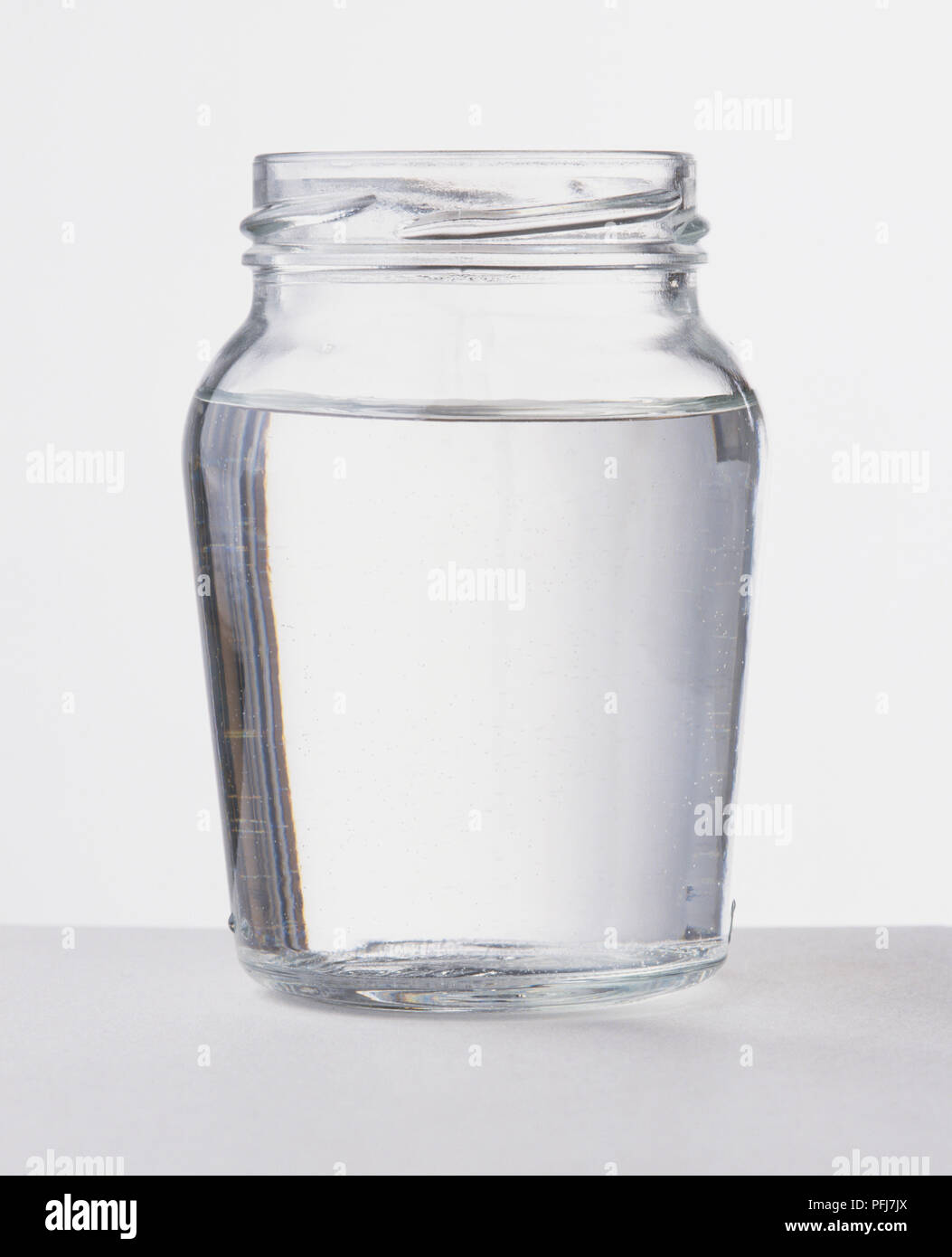 https://c8.alamy.com/comp/PFJ7JX/glass-jar-without-lid-filled-with-water-PFJ7JX.jpg