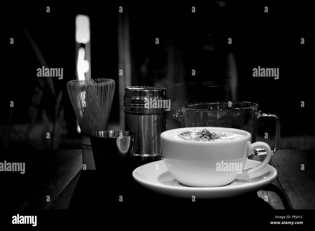 https://c8.alamy.com/comp/PFJA1C/high-contrast-coffee-cup-and-measuring-cup-and-coffee-set-in-black-and-white-PFJA1C.jpg