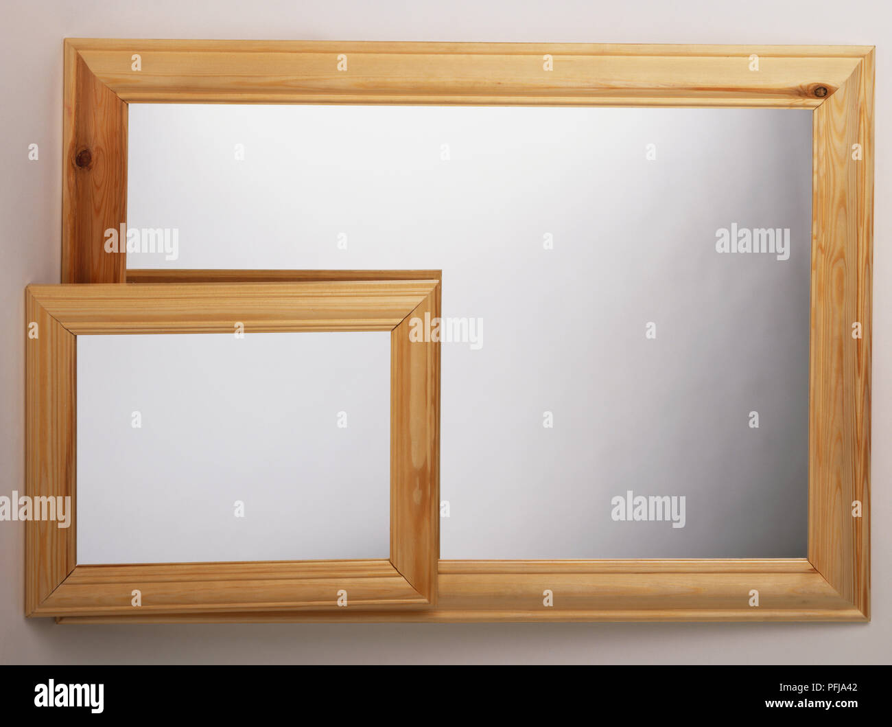 Rectangular mirror in wooden frame Stock Photo