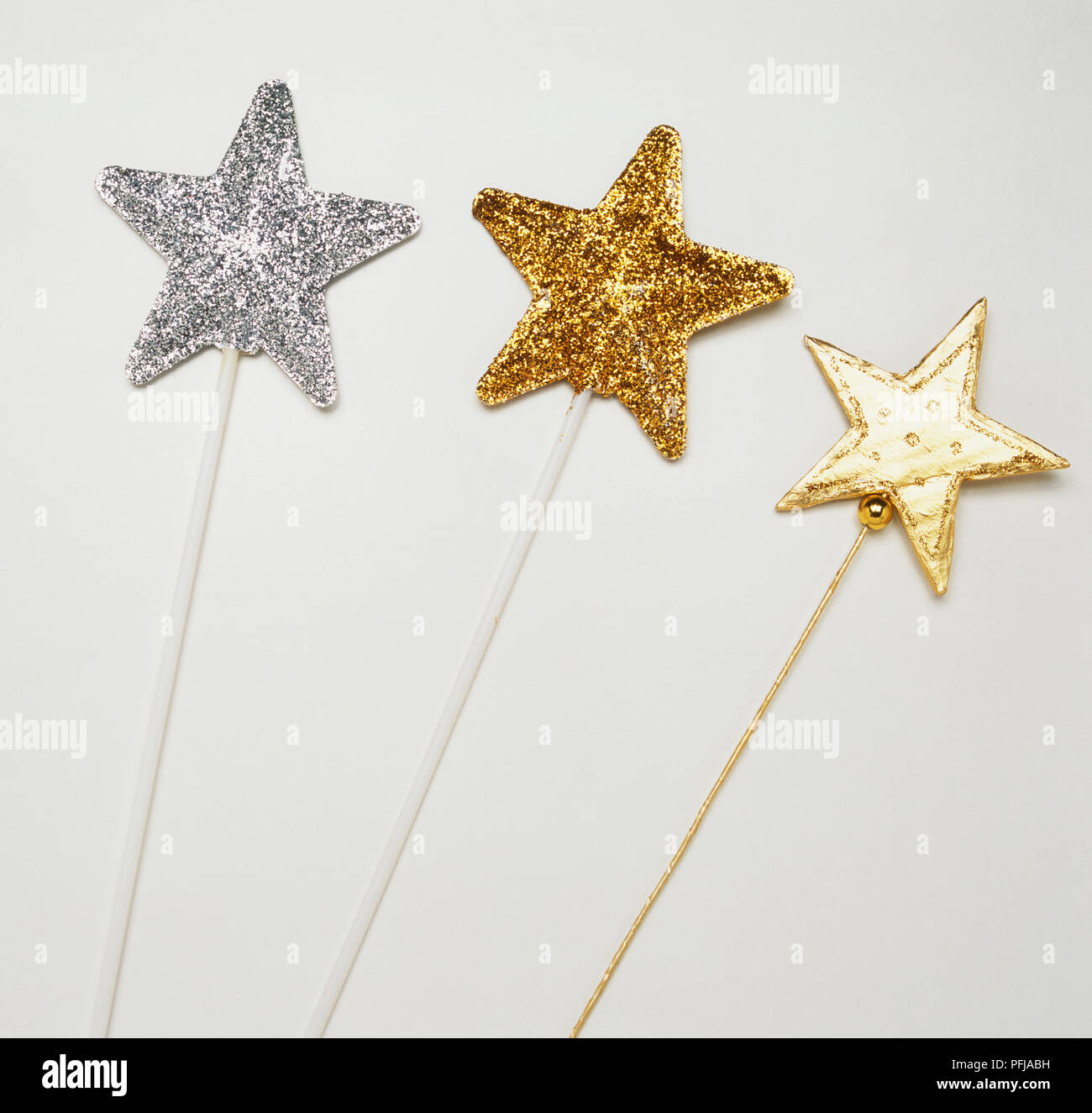 Three fairy wands, silver and gold Stock Photo Alamy