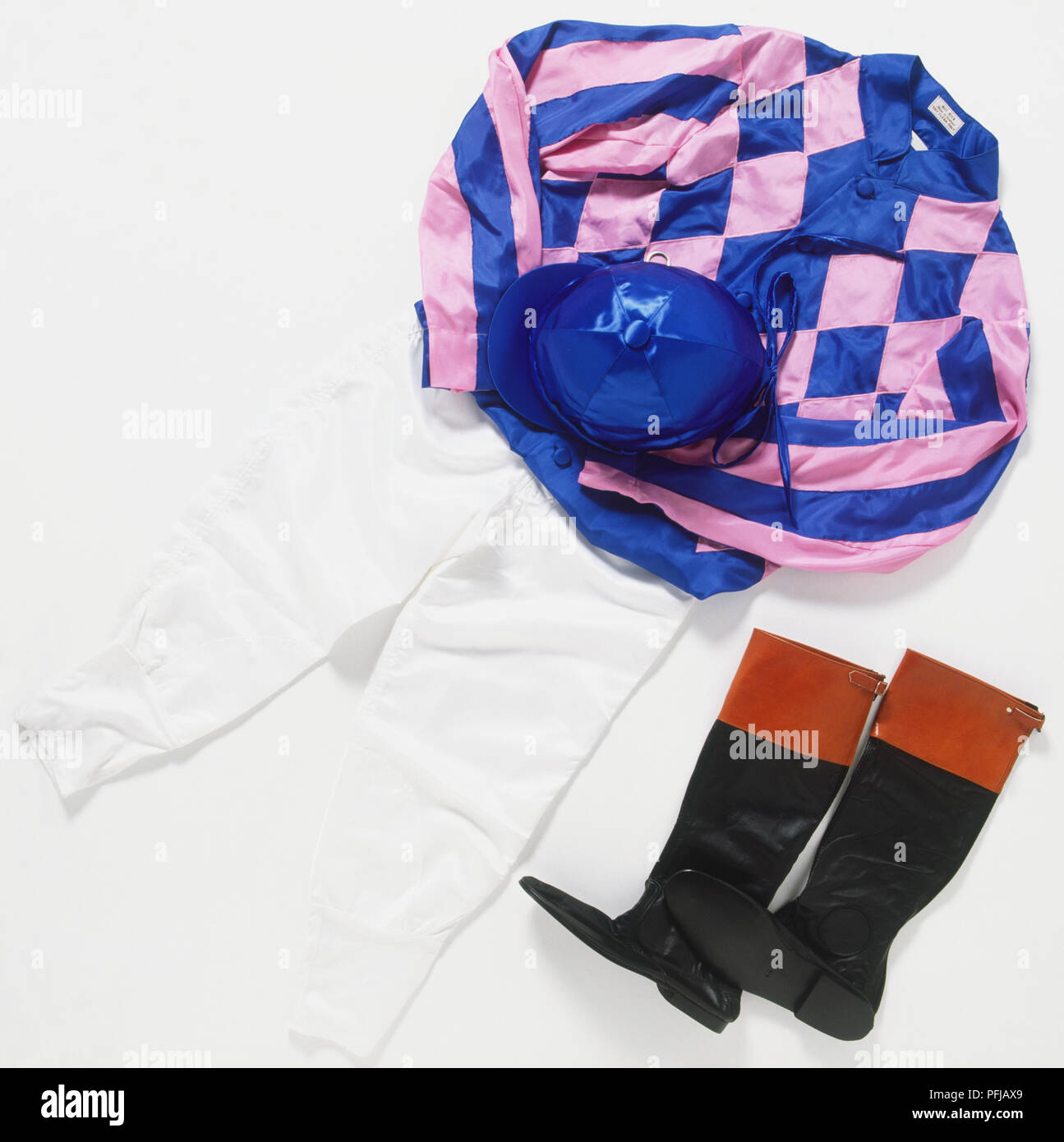 Jockey silks and riding boots Stock Photo Alamy