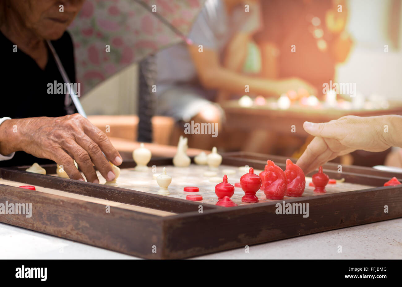 Elderly Thai Meet Friend And Play Local Chess Game Together, Shot In  Chantaburi Thailand. Stock Photo, Picture and Royalty Free Image. Image  83102854.