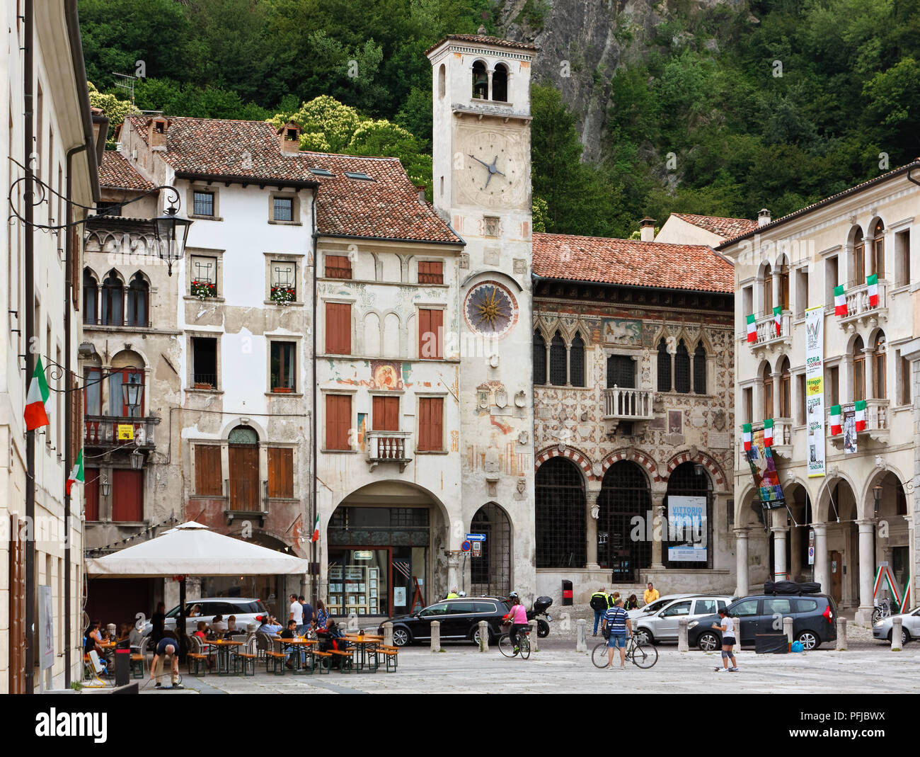 VITTORIO VENETO, Italy - July 1, 2018: Piazza Flaminio in the historic district of Serravalle, with the Loggia and the civic tower Stock Photo