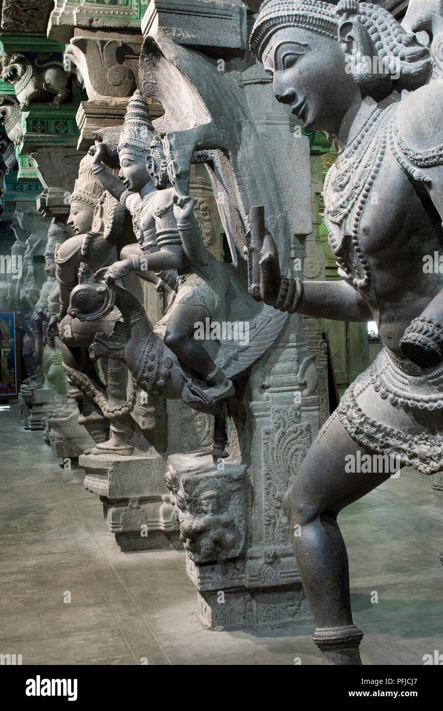 India, Tamil Nadu, Madurai, Meenakshi Temple, row of statues, closeup