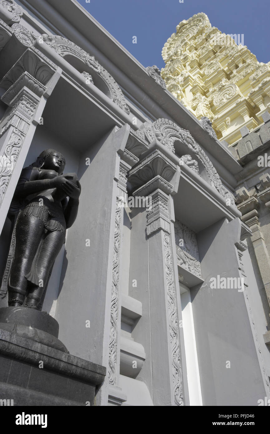 Great Britain, England, London, Manor Park, Sri Murugan Temple, ornate facade with bronze statue, low angle view Stock Photo