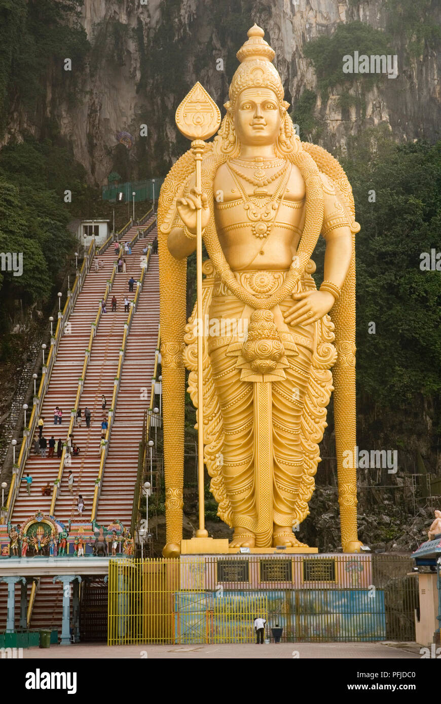Malaysia, large gold statue of Hindu deity Murugan outside Batu ...
