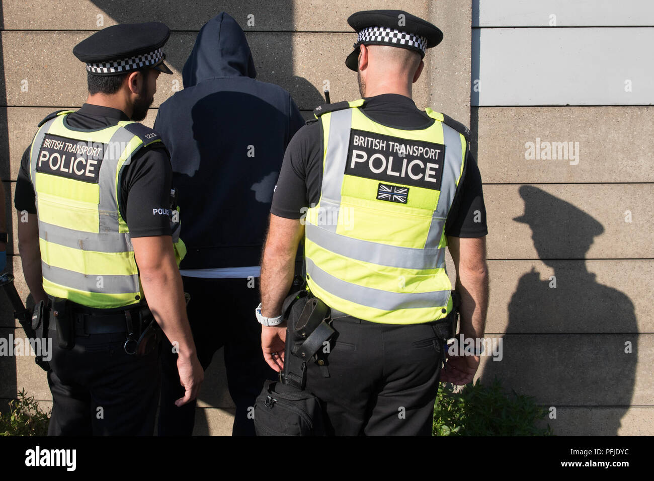 A motorist is pulled over by officers from the Violent Crime Task Force working in partnership with units across the Metropoltan Police carrying out an intelligence led stop and search operation targeting violent crime in London using the road network. Stock Photo