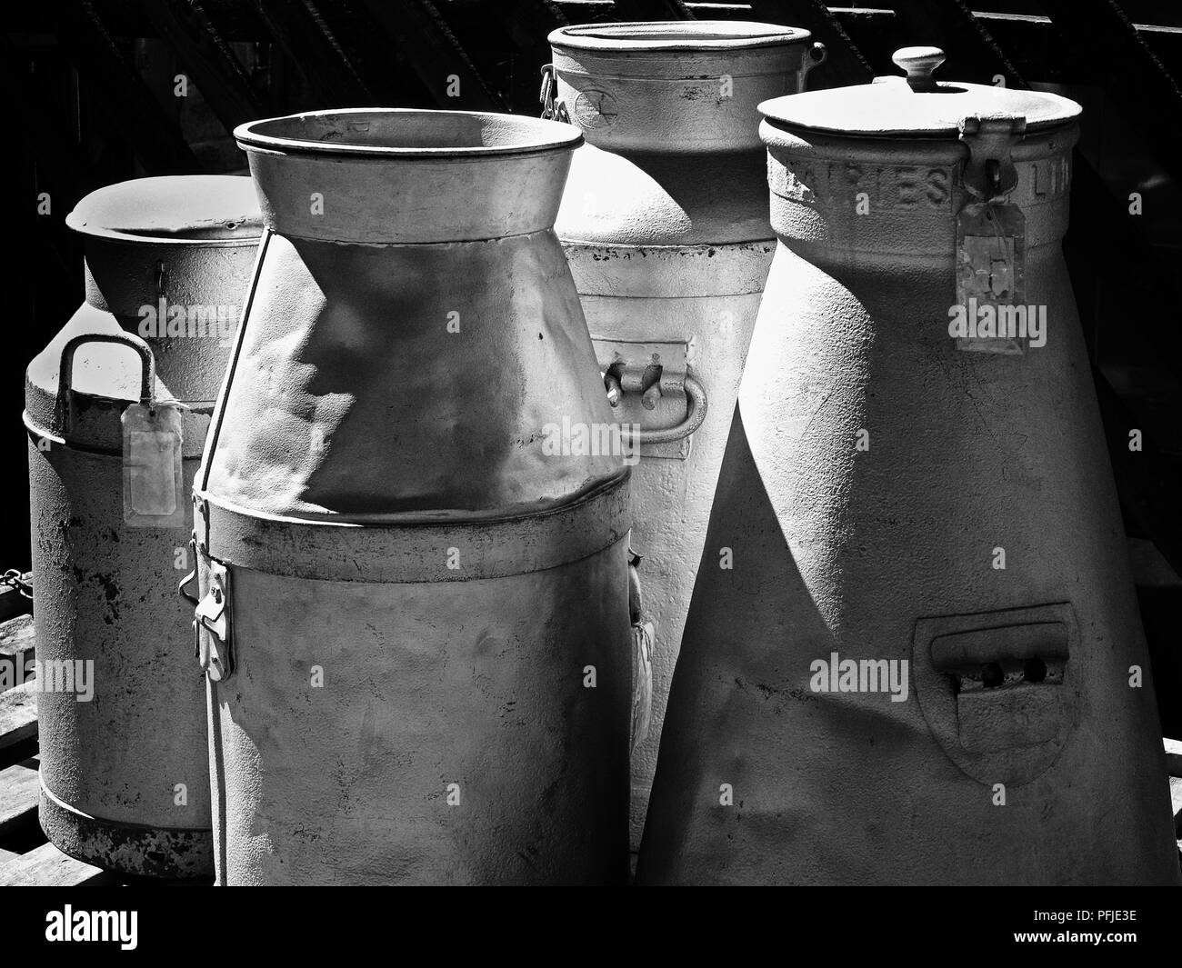 Milk churns in abstract at Ingrow Station, on the KWVR line Stock Photo