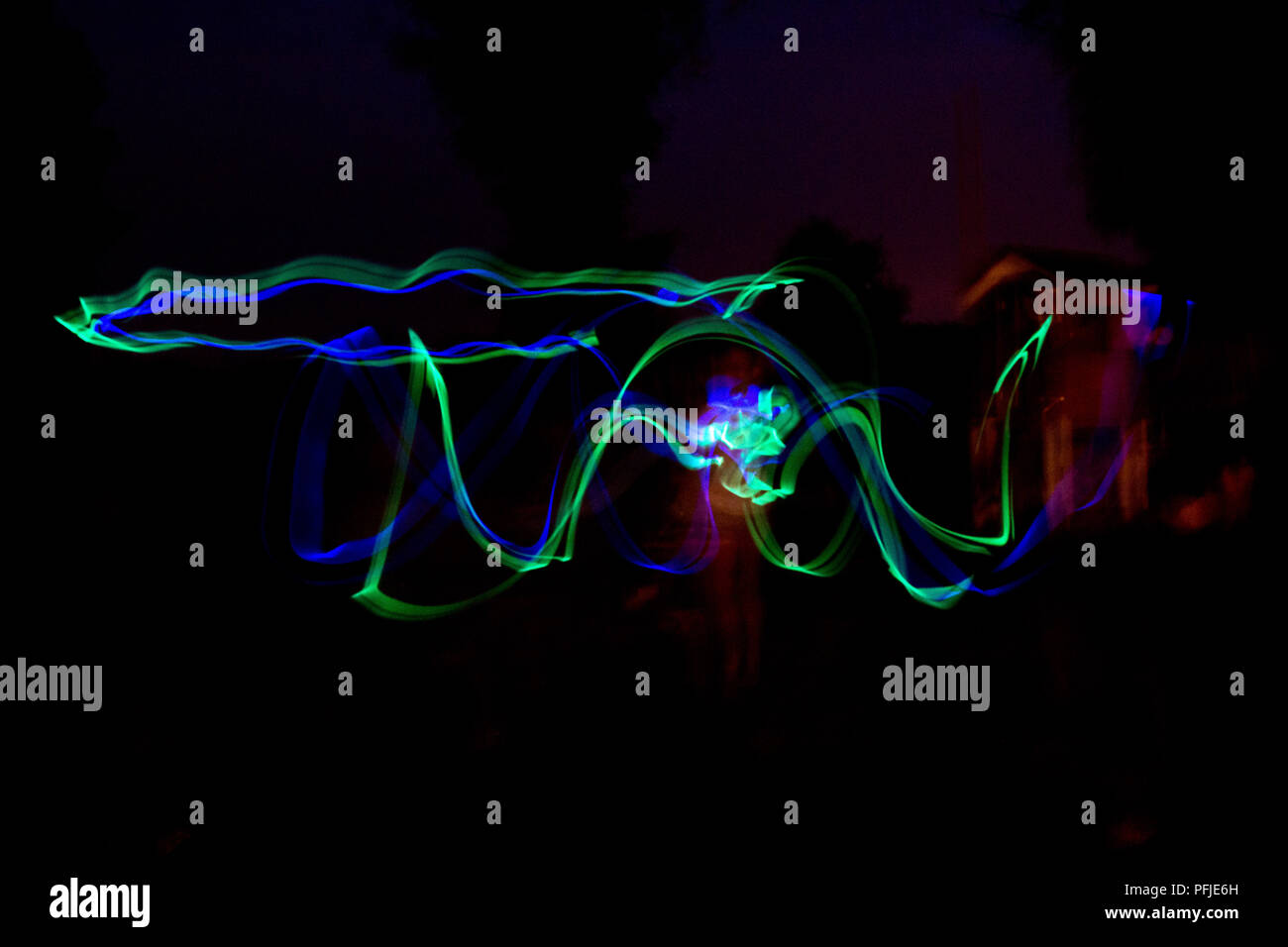 Blue neon light trails hi-res stock photography and images - Alamy