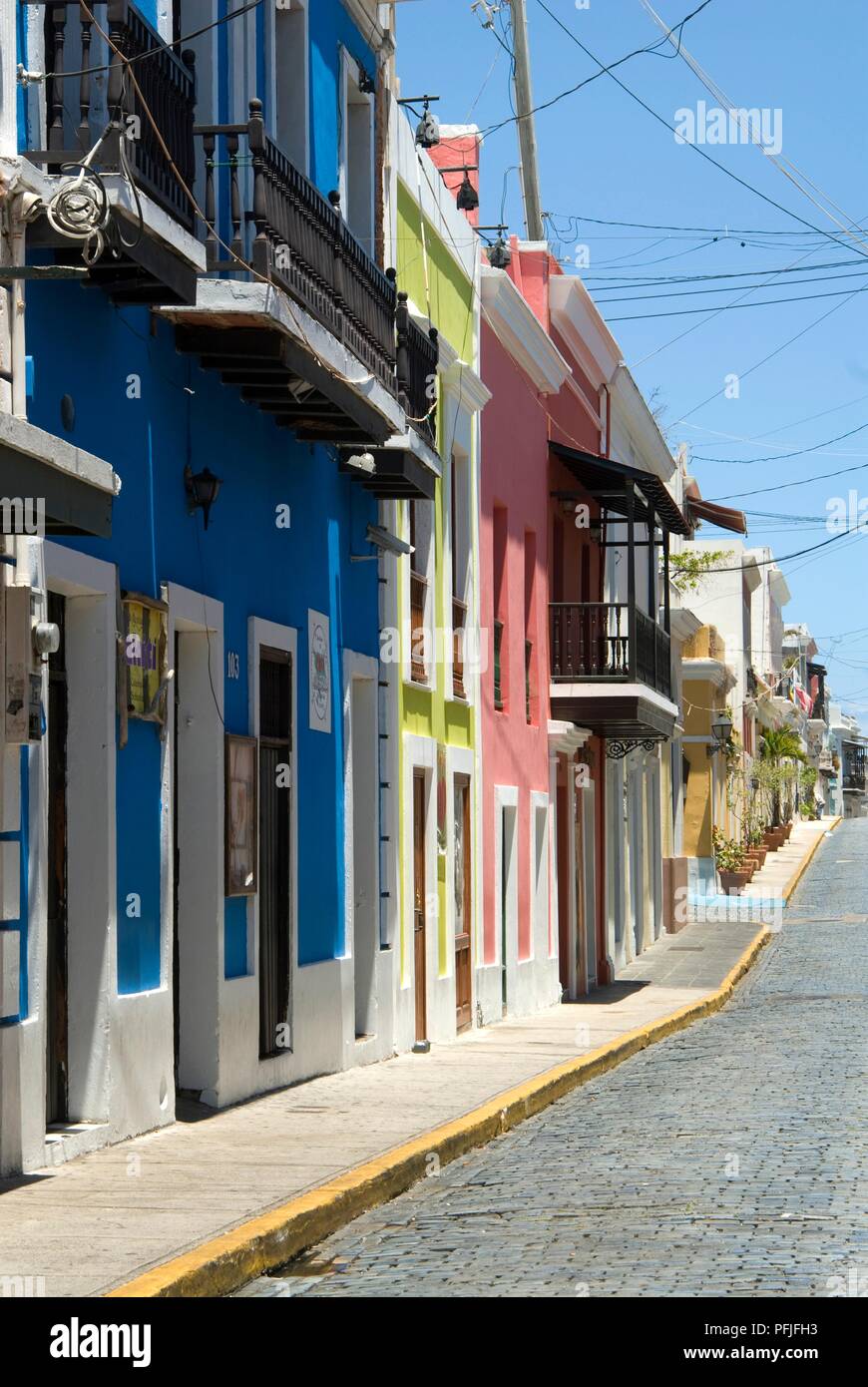 Puerto Rico, San Juan, Calle de San Sebastian, colourful houses lining street Stock Photo