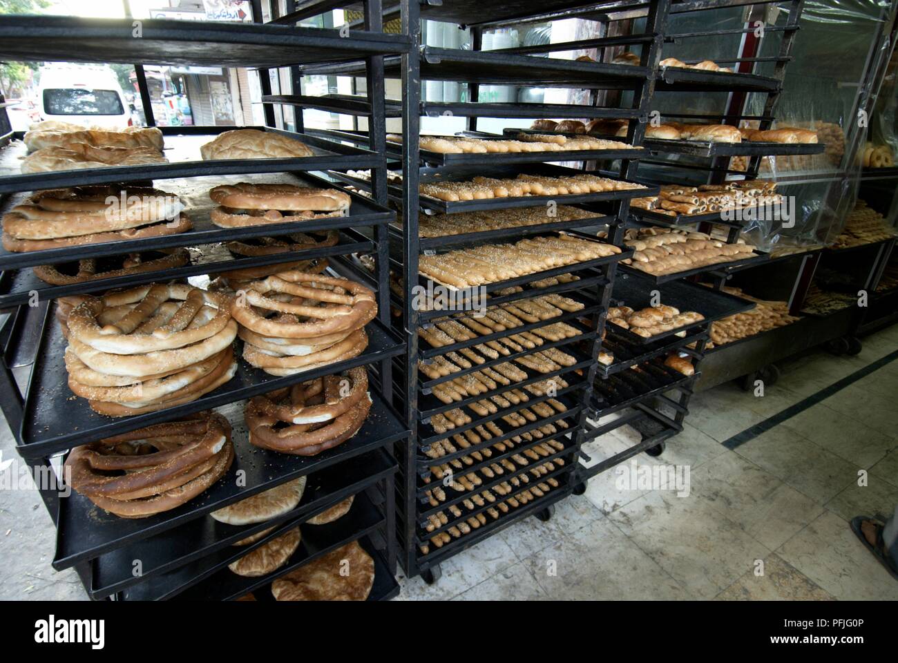 Egypt, Cairo, racks of fresh breads and pastry outside bakery Stock Photo Alamy