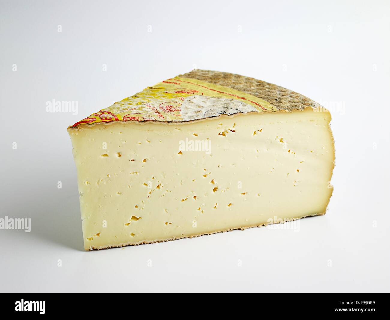 Slice of Italian Bra PDO cow's milk cheese Stock Photo
