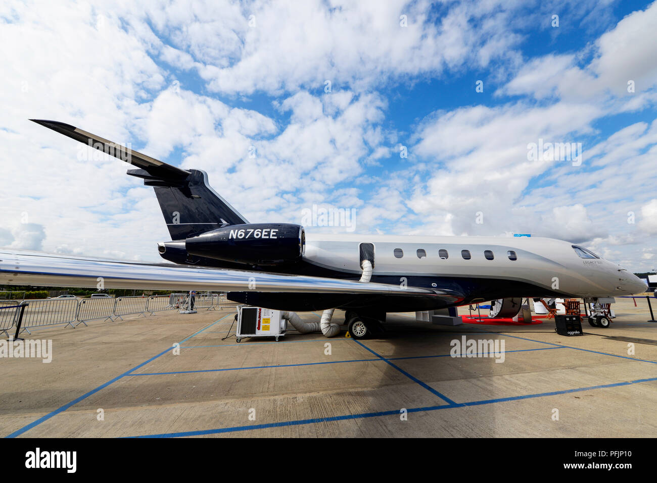 Embraer Legacy 500 at the Farnborough International Airshow FIA, aviation, aerospace trade show. Business jet. Corporate jet plane. Space for copy Stock Photo