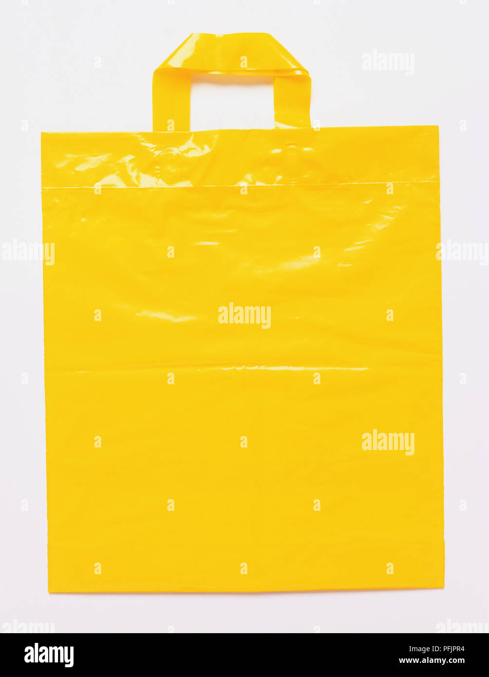 Download Yellow Plastic Carrier Bag Front View Stock Photo Alamy Yellowimages Mockups