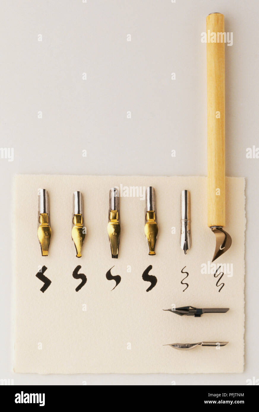 Dip pen and a selection of nibs Stock Photo Alamy