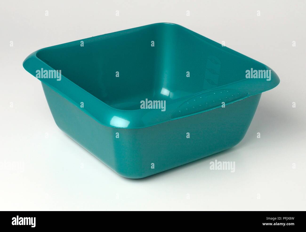 Green plastic washingup bowl Stock Photo Alamy