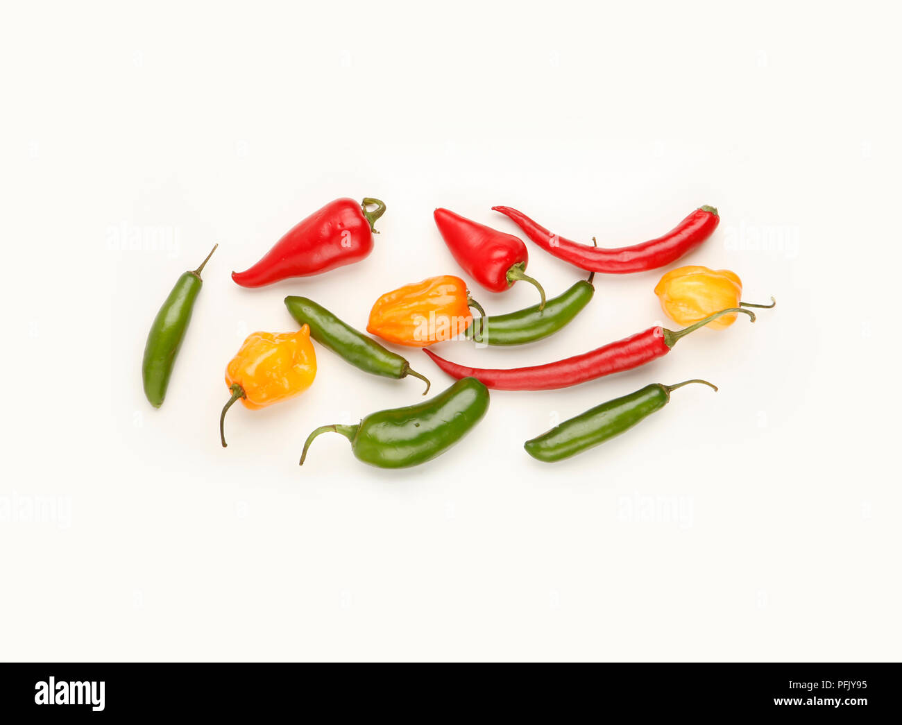 Selection of red, green and yellow chilli peppers Stock Photo - Alamy