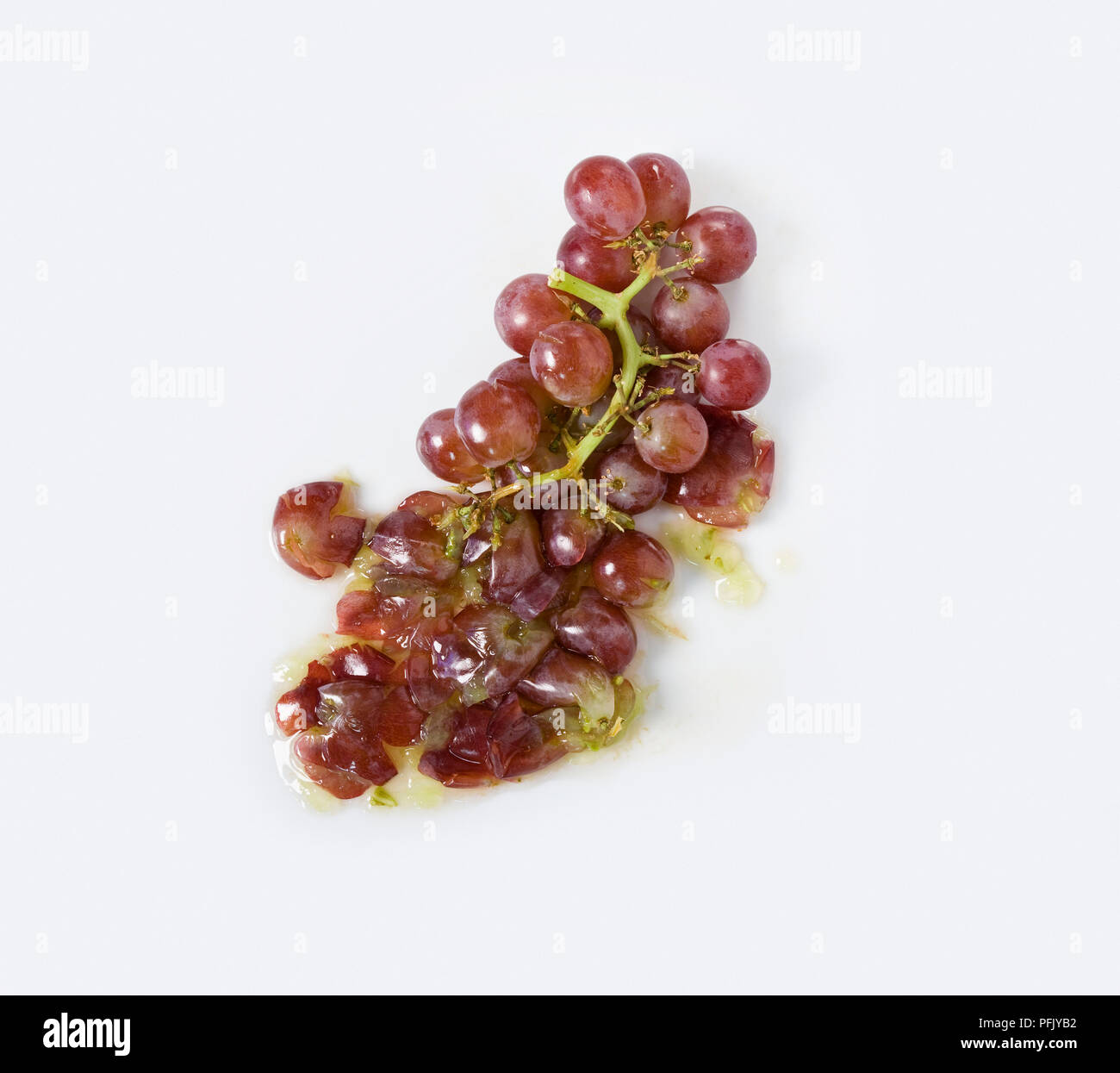 Crushed red grapes Stock Photo