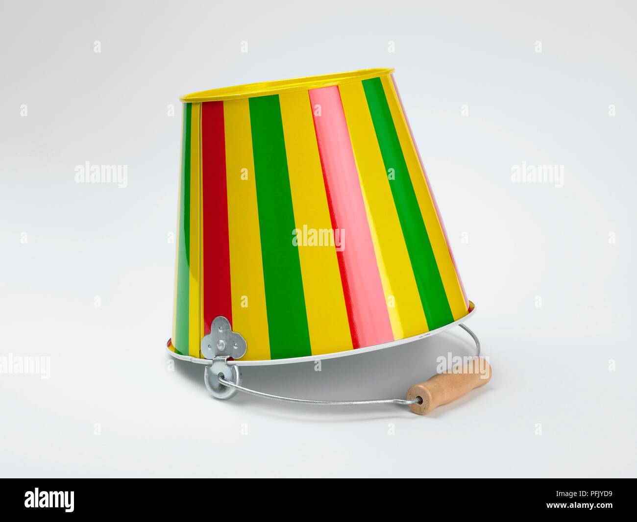 Overturned stripy bucket Stock Photo