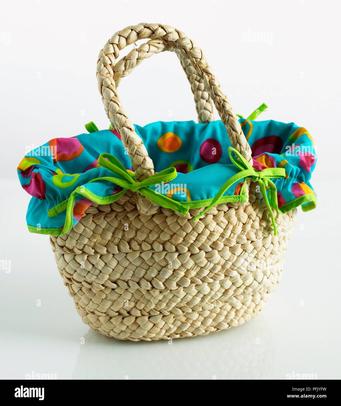 Woven bag with colourful lining Stock Photo