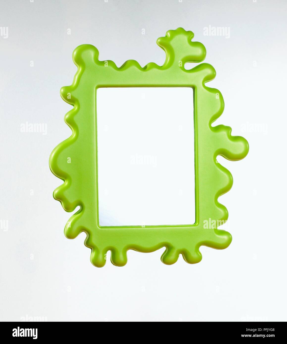 Mirror in green plastic frame Stock Photo Alamy