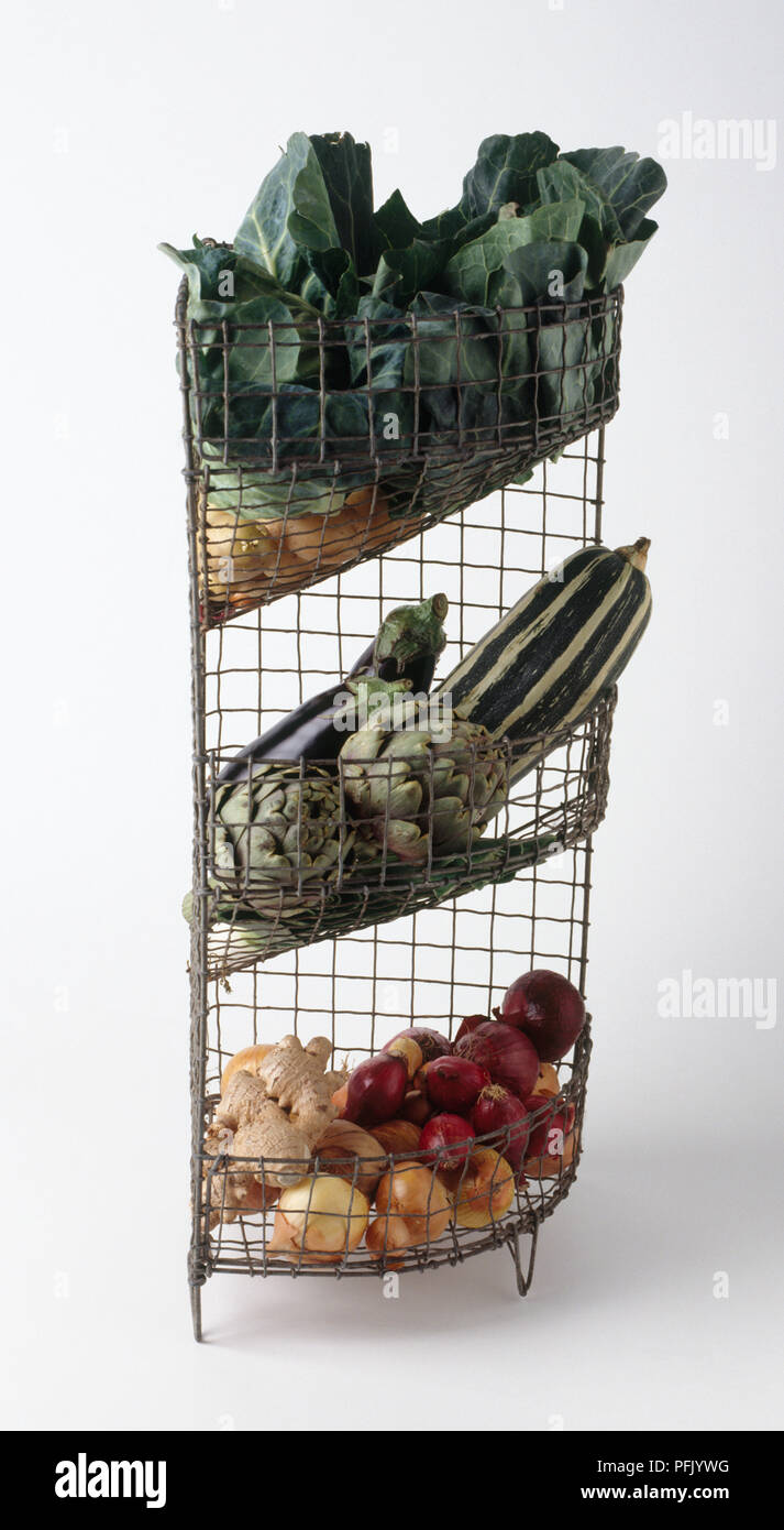 Wire rack shelving unit containing vegetables Stock Photo Alamy
