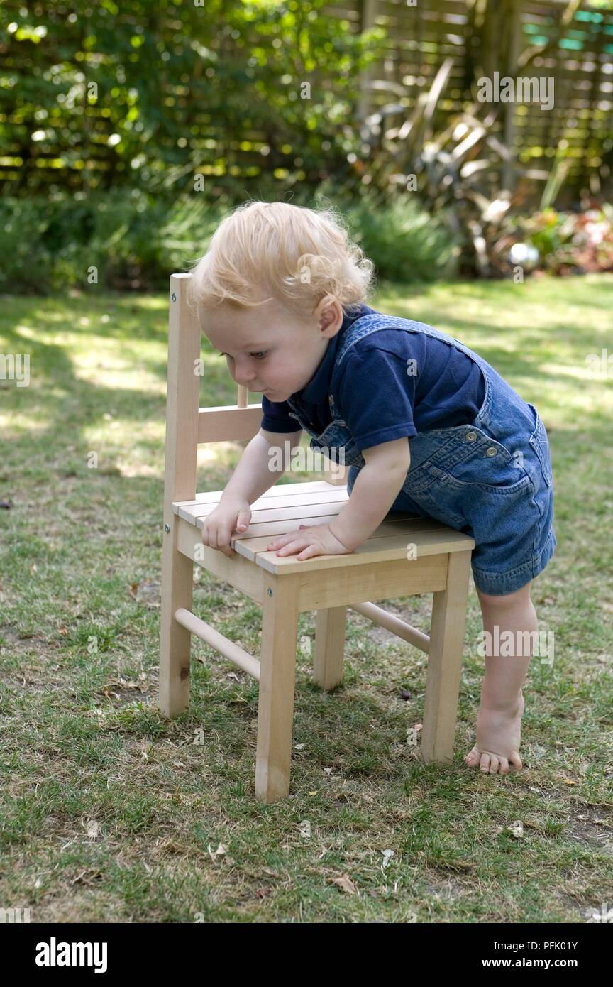 Toddler climbing chair hires stock photography and images Alamy