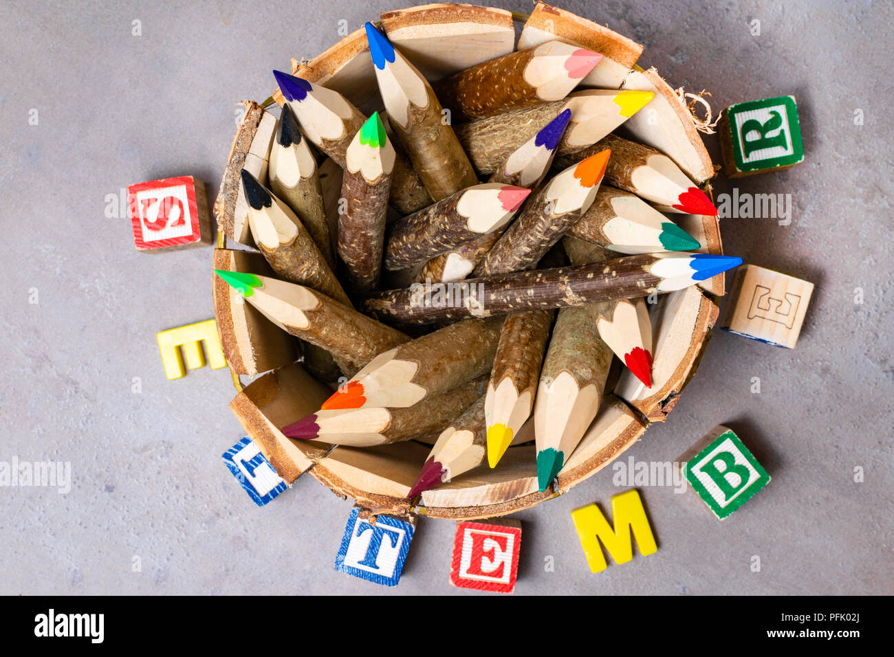 Back to school and education banner with colorful pencils, Frame of multicolored pencil on grey background. The first of September. Go to school Stock Photo