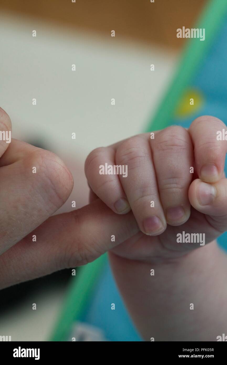 Hand around hi-res stock photography and images - Alamy