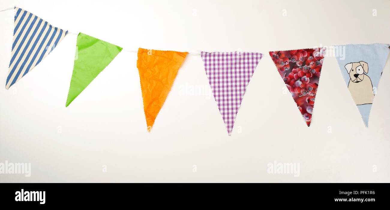Bunting made from various materials, including textile, plastic, paper Stock Photo