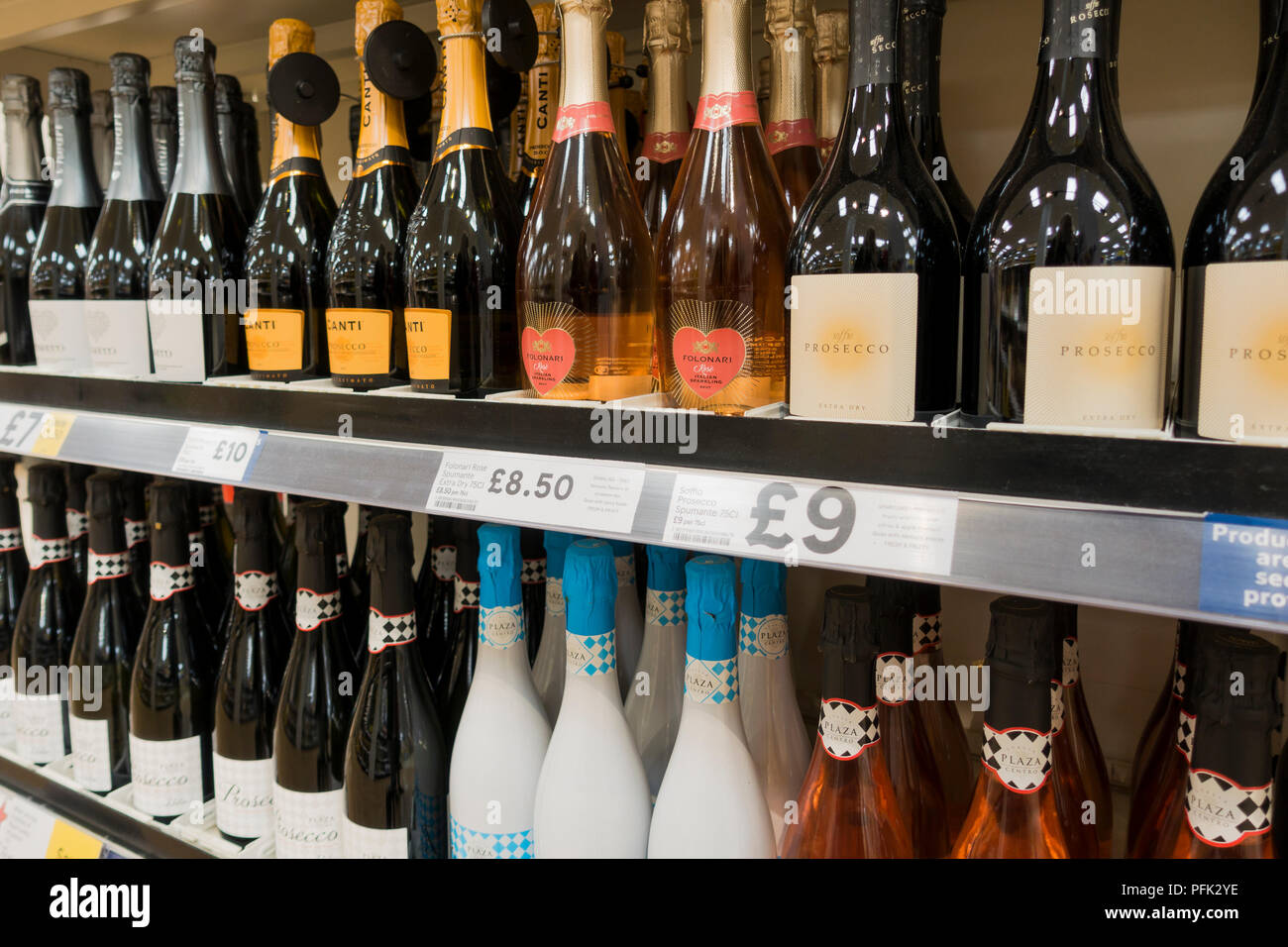 Bottles of wine on display, for sale on supermarket shelves, united Kingdom Stock Photo