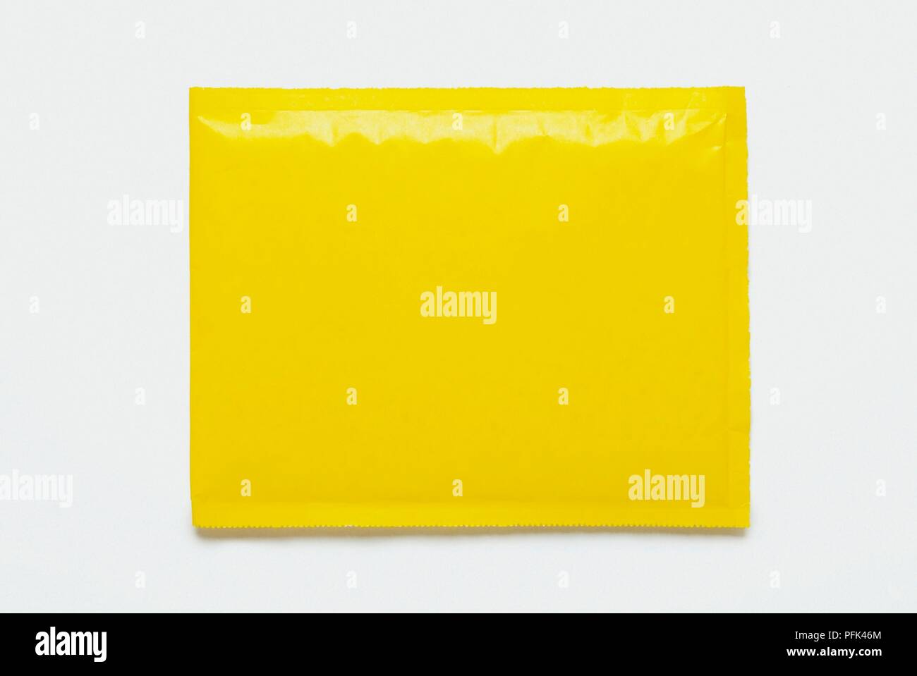 Yellow padded envelope Stock Photo