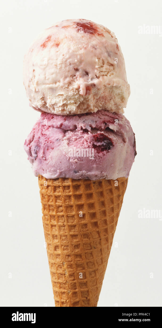 Ice cream cone, two fruit flavoured scoops Stock Photo