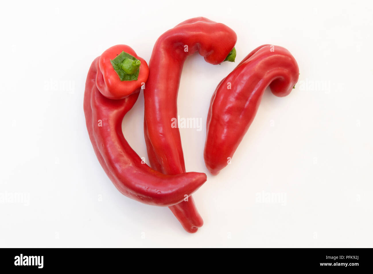 Three red Romano peppers Stock Photo Alamy