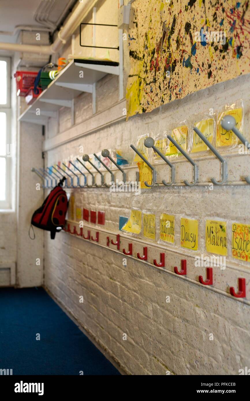 Children's coat hooks at school Stock Photo - Alamy