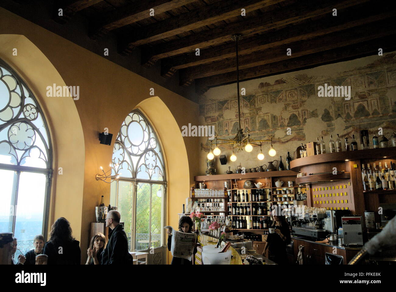 Italy, the medieval upper town of Bergamo.  The atmospheric cafe by the funicular railway station Stock Photo