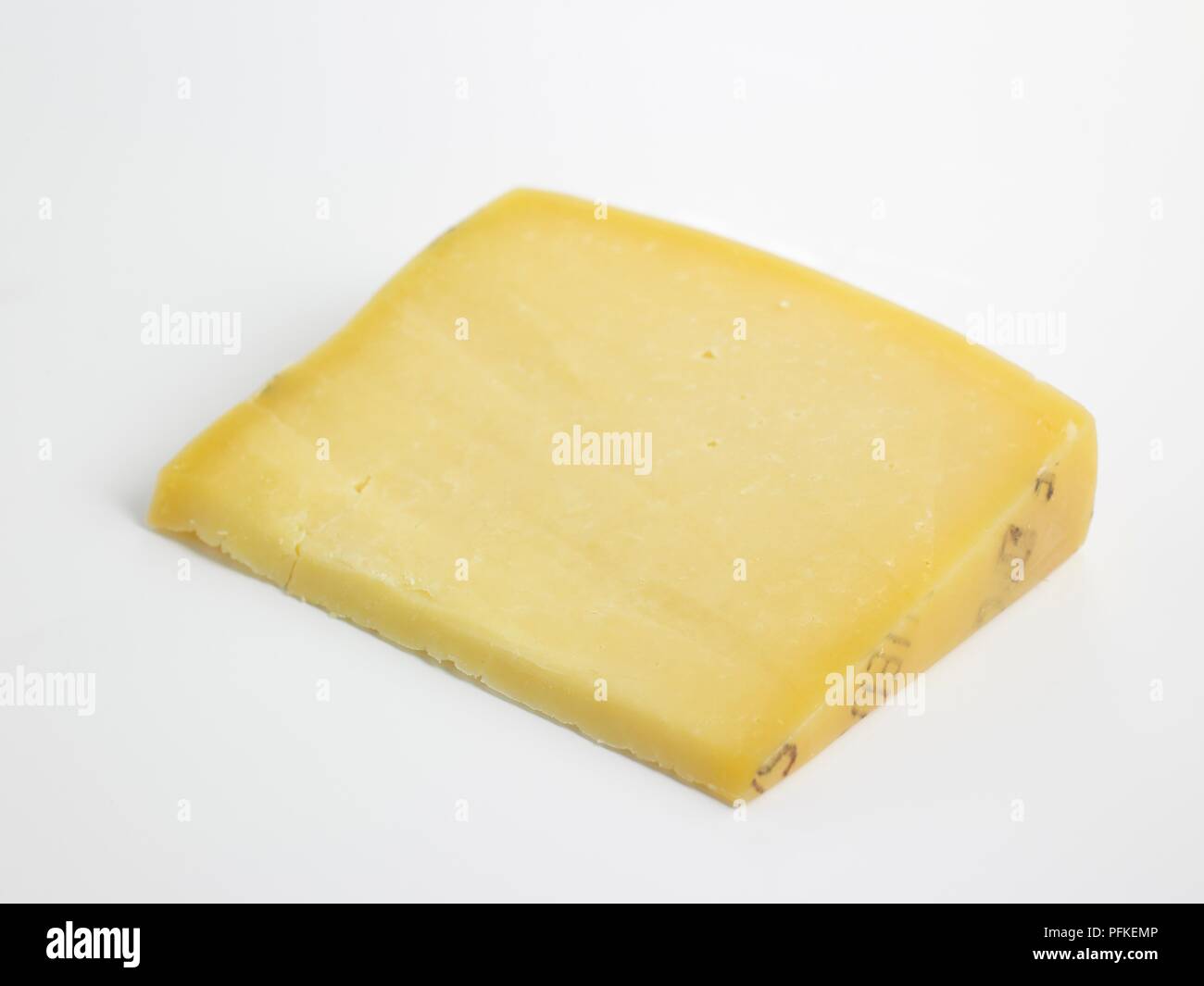 Slice of Portuguese Sao DOP cow's milk cheese Stock Photo Alamy