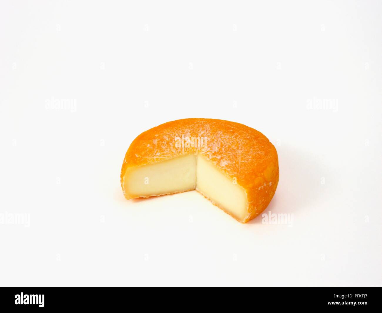 Canadian Harvest Moon cow's milk cheese with orange rind Stock Photo