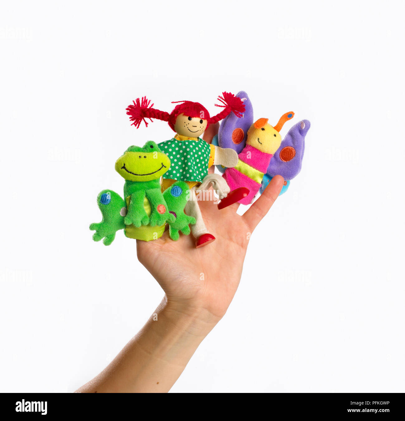 Five finger puppets on child's hand Stock Photo