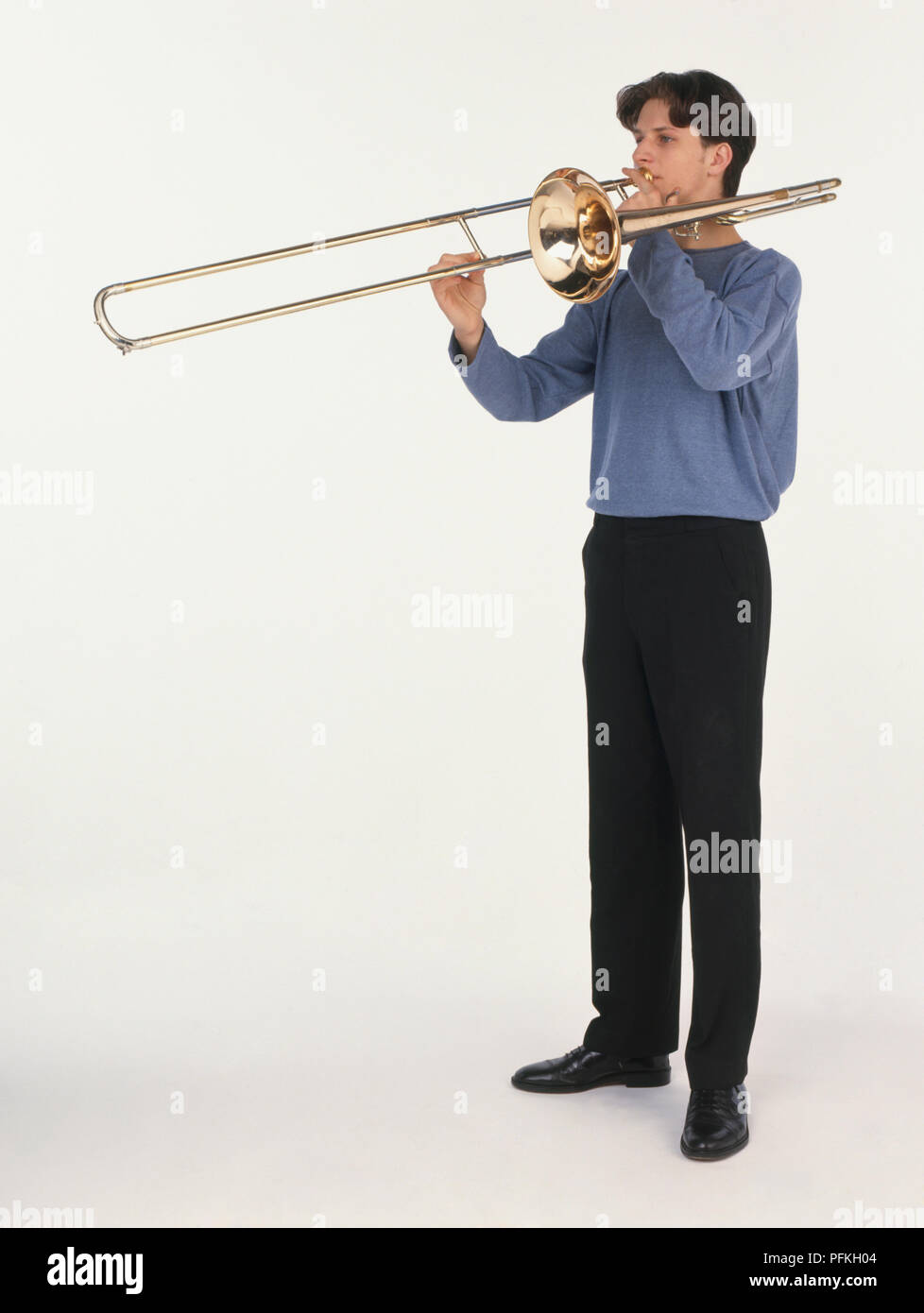 Man playing trombone hi-res stock photography and images - Alamy