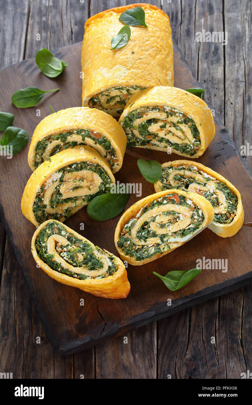 egg and cheese roulade served in the form of a roll made from a flat ...