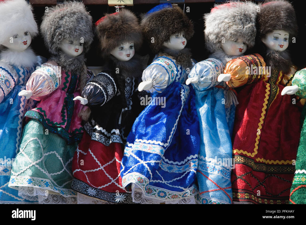 Russia, St Petersburg, china dolls on market stall wearing traditional Russian costumes Stock Photo