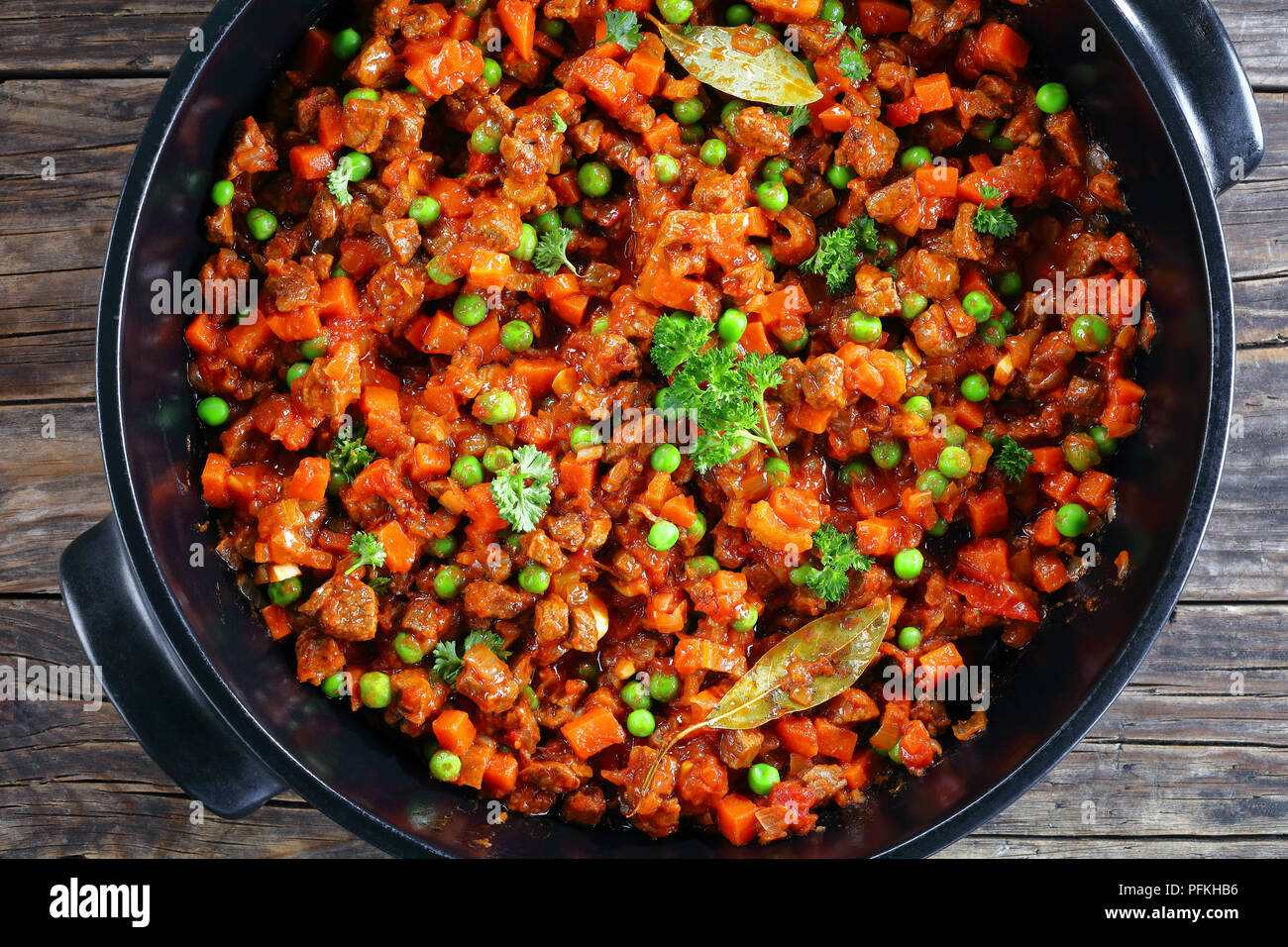 delicious classic ragu with minced beef, vegetables, green peas and