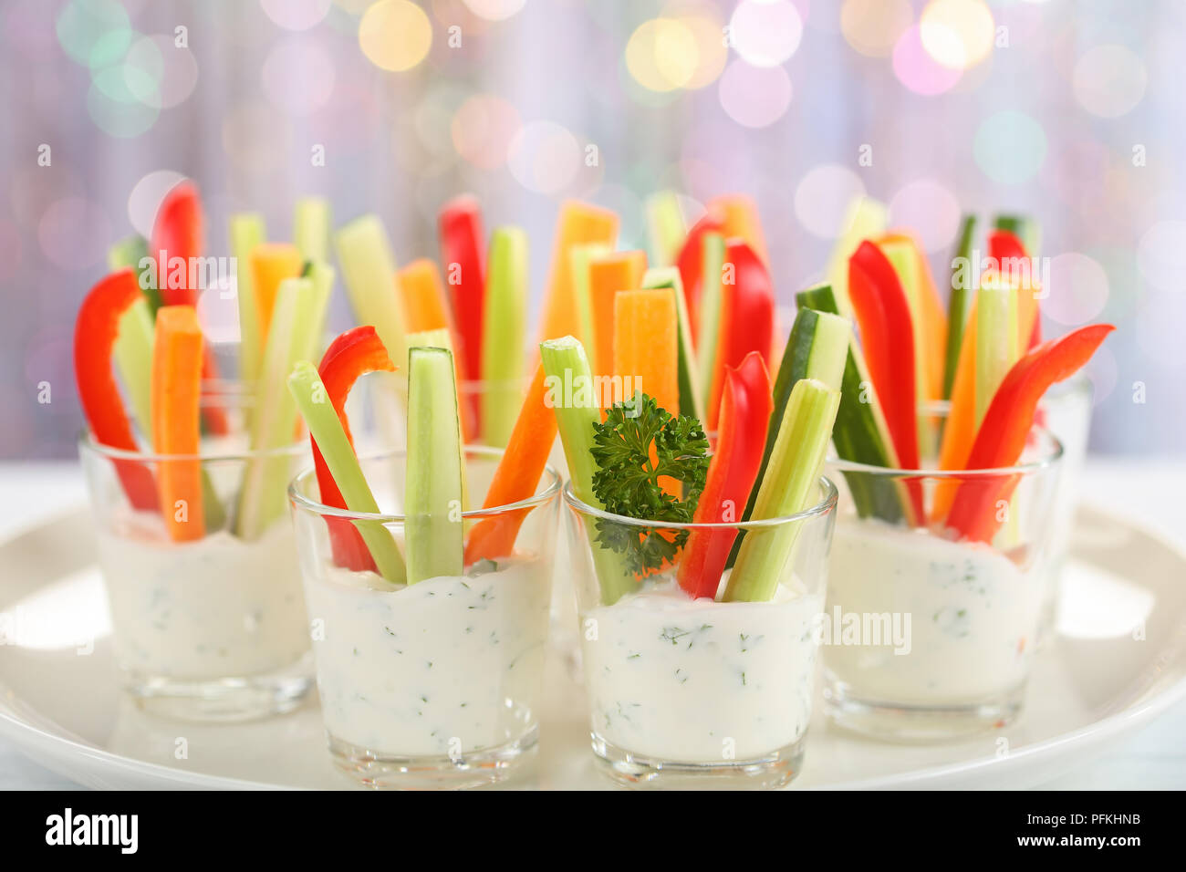 Verrines appetizer with carrot, cucumber, celery and red bell pepper