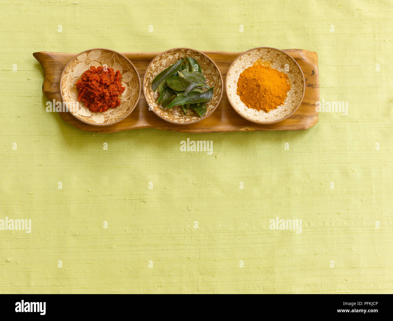 Curry paste, curry leaves, curry powder Stock Photo Alamy